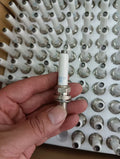 7C4D NGK spark plug OEM
