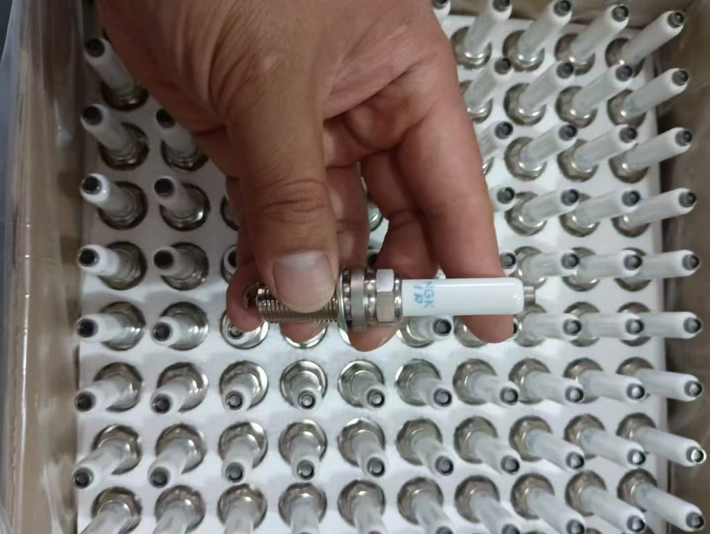 7C4D NGK spark plug OEM